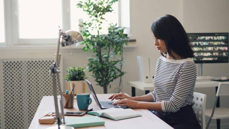 Woman looking up how to build an emergency fund
